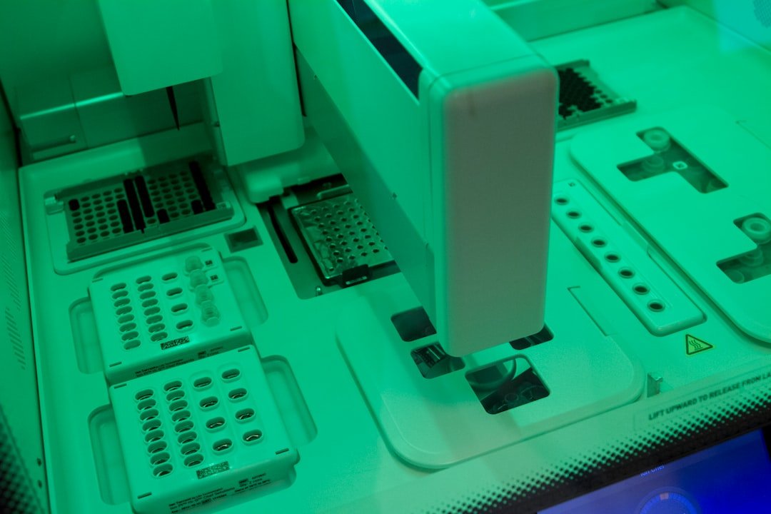 white and teal printer on white desk